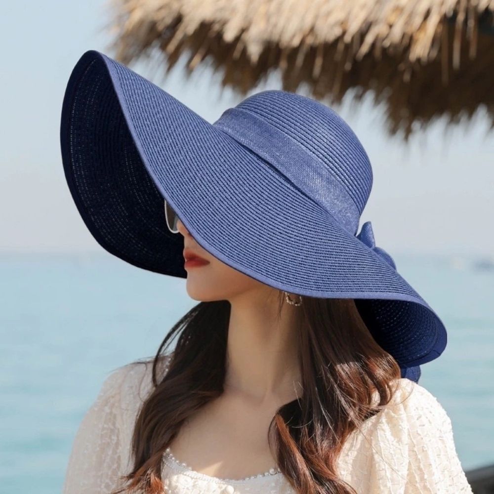 MOD-Product-35-1.jpg Navy Blue Oversized Wide-Brim Beach Straw Hat with Ribbon - Image 1